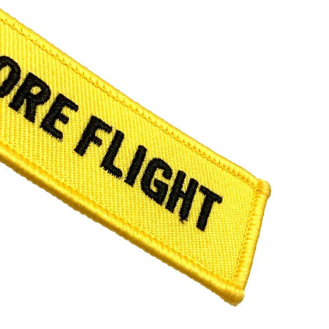 Nyckelband - REMOVE BEFORE FLIGHT / FOLLOW ME - Gul/Svart