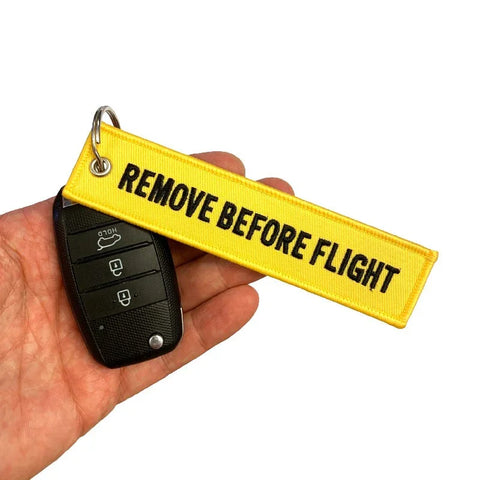 Nyckelband - REMOVE BEFORE FLIGHT / FOLLOW ME - Gul/Svart