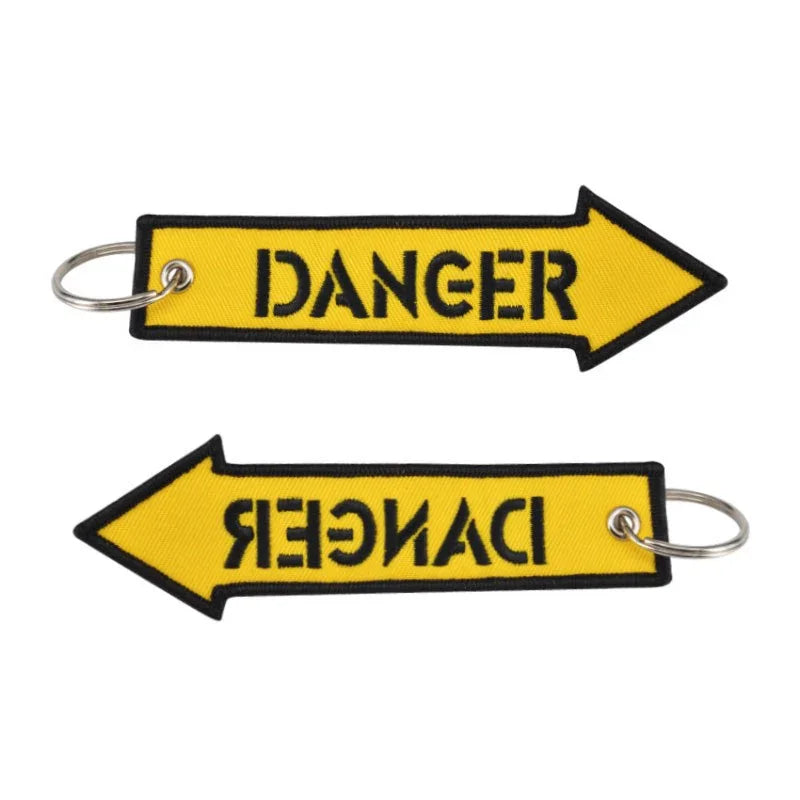 Nyckelband - DANGER - Gul pil - Action King