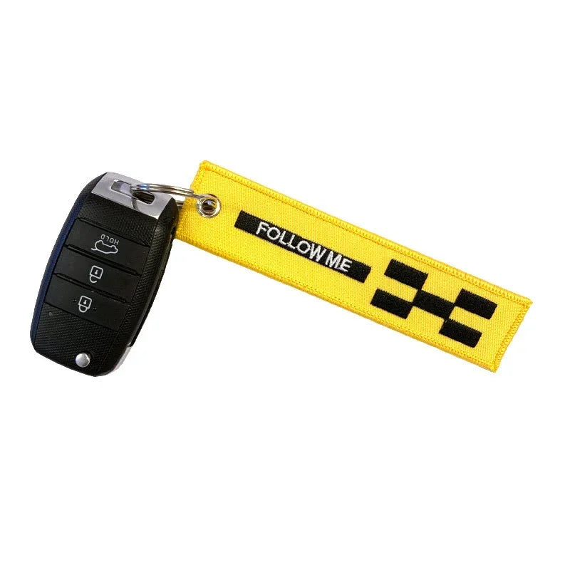 Nyckelband - REMOVE BEFORE FLIGHT / FOLLOW ME - Gul/Svart - Action King
