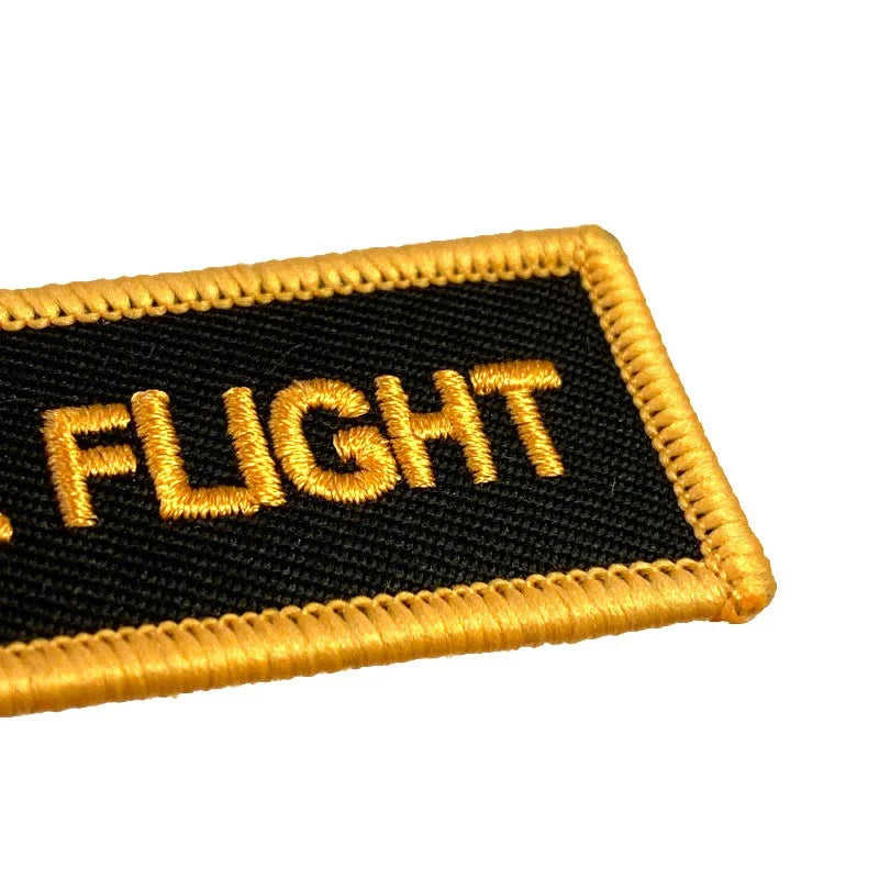 Nyckelband - REMOVE BEFORE FLIGHT - Svart/Orange - Action King