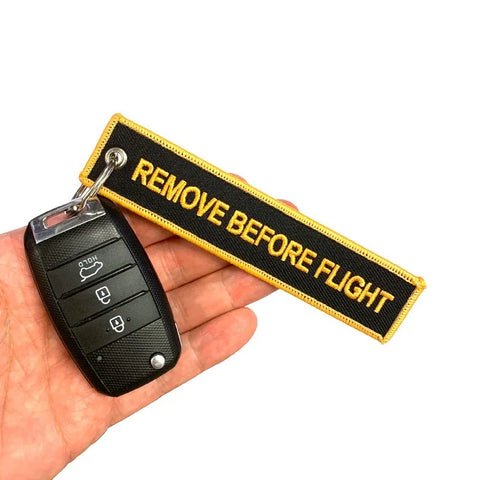 Nyckelband - REMOVE BEFORE FLIGHT - Svart/Orange