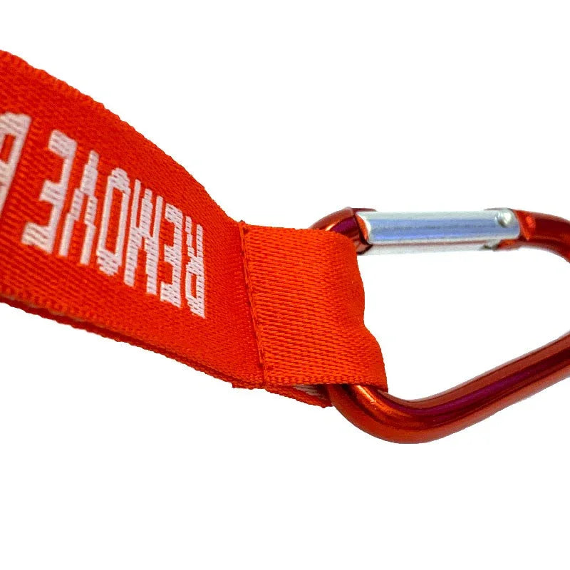 Nyckelband - REMOVE BEFORE FLIGHT - Röd/Vit - Karbinhake - Action King