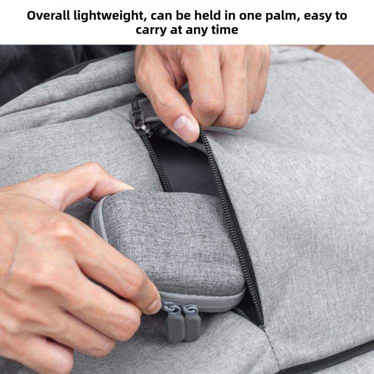 Stötsäker miniväska för DJI Osmo Action 6, skyddar kameran vid transport, svart färg.