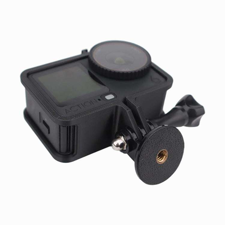 Actionkamera monterad i Cold Shoe Cage Expansion Adapter Frame med adapterplatta för stativanslutning och tillbehör.