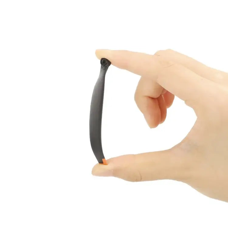 6030F Dubbelsidiga propellrar för DJI Mini 4/3 Pro, orange spets. Låg ljudnivå, förbättrad flygning.